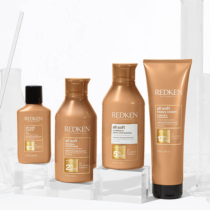 Imagem mostrando as novas embalagens da linha All Soft | Redken